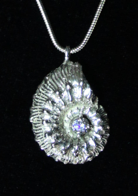 Ammonite fossil and cubic zirconia pendant
